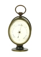 Lot 233 - A lacquered brass desk aneroid barometer