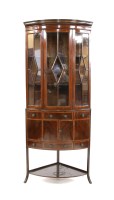 Lot 622 - An Edwardian mahogany crossbanded bow front cabinet