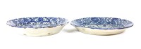 Lot 419 - A pair of blue and white pottery plates