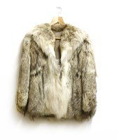 Lot 551 - A grey long haired fur jacket