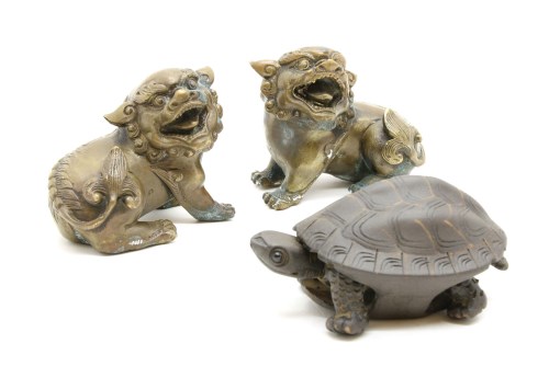 Lot 414 - A pair of Chinese Buddhist lions and a Japanese turtle
