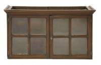 Lot 640 - An oak wall mounted cabinet