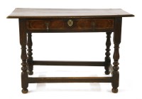 Lot 624 - An 18th century oak and walnut side table