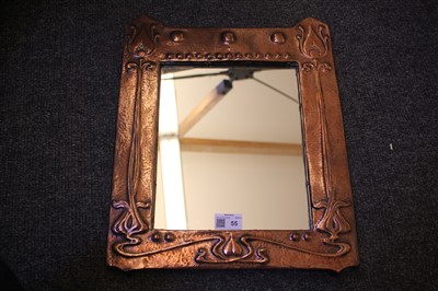 Lot 55 - An Arts & Crafts embossed copper mirror