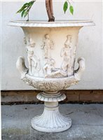 Lot 1089 - A classical design faux marble twin handled urn