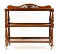 Lot 586 - A mid Victorian mahogany three tier buffet