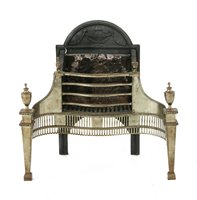 Lot 547 - An iron and brass firebasket