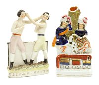 Lot 141 - Two Victorian Staffordshire figures