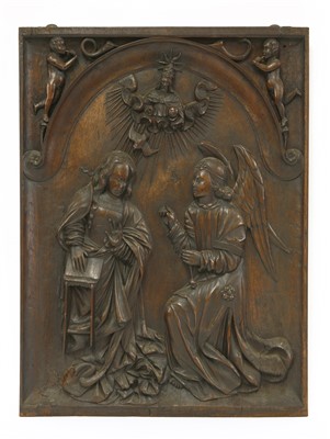 Lot 392 - A relief carved panel of The Annunciation