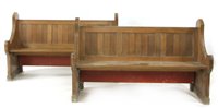 Lot 614 - A pair of short carved oak pews