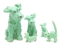 Lot 359 - A collection of four graduating Sylvac dogs