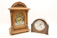 Lot 194 - A German oak cased mantel clock by Kienzel