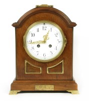 Lot 152 - A late 19th century mahogany mantle clock