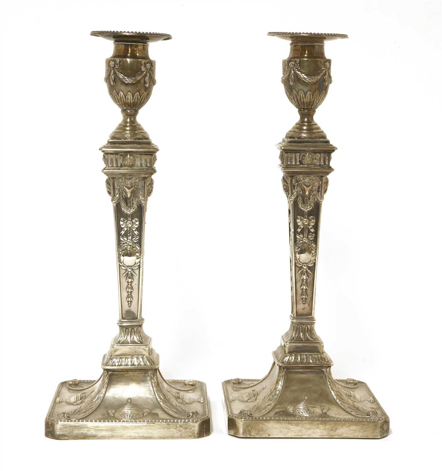 Lot 38 - A pair of George lll Adam design silver candlesticks