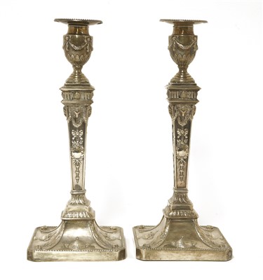 Lot 38 - A pair of George lll Adam design silver candlesticks