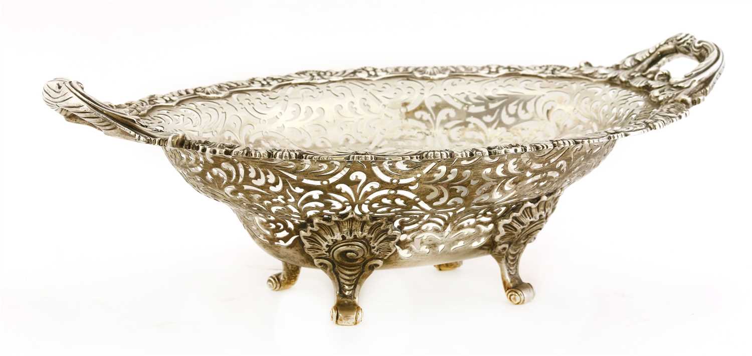 Lot 26 - A large silver and pierced oval basket