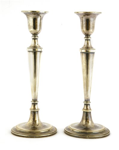 Lot 38 - A pair of silver candlesticks