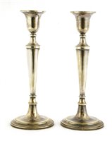 Lot 38 - A pair of silver candlesticks
