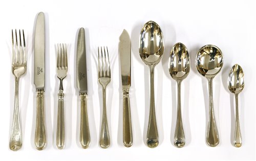 Lot 104 - A matched twelve-setting canteen of flatware and cutlery