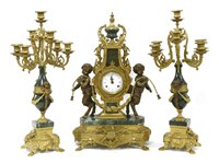 Lot 566 - A Louis XV-style clock garniture