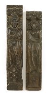 Lot 722 - A pair of carved oak term figures