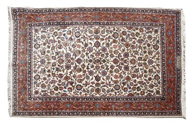 Lot 624 - A Persian cream ground carpet