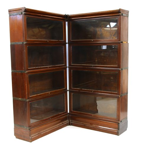 Lot 609 - A Globe Wernicke mahogany corner bookcase of four sections