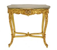 Lot 765 - A Louis XV-style giltwood and marble top side table