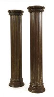 Lot 550 - A pair of large fluted columns