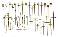Lot 169 - A collection of thirty-two miniature swords