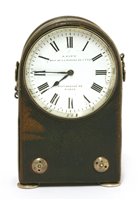 Lot 764 - A French brown leather cased travelling clock