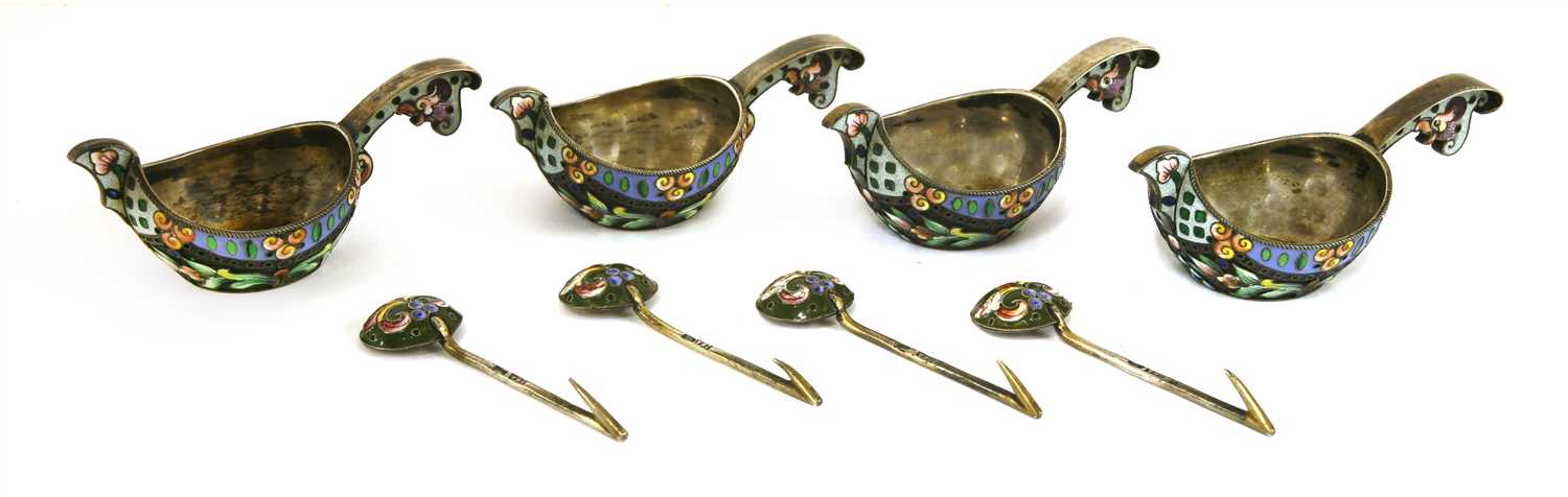 Lot 87 - A set of four Russian silver and enamel kovshi