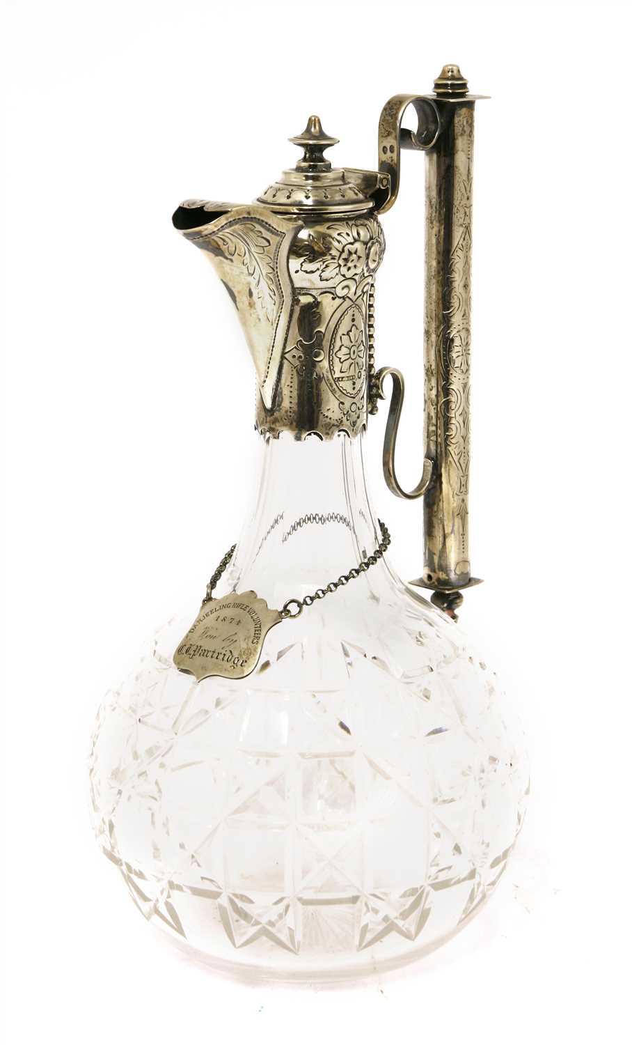 Lot 76 - A silver-mounted cut glass claret jug