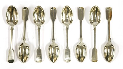 Lot 136 - A set of twenty-four Victorian silver fiddle pattern dessert spoons
