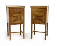 Lot 672 - A pair of Edwardian walnut bedside cabinets