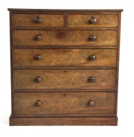 Lot 668 - A Victorian walnut chest of two short and four long drawers