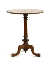 Lot 589 - A 19th century pollard oak tripod table