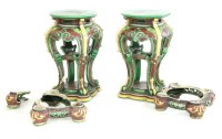 Lot 590 - A pair of Victorian Majolica jardinière stands