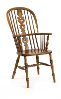 Lot 632A - An ash and elm Windsor armchair on turned supports