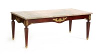 Lot 662 - A marble topped coffee table