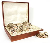 Lot 391 - An early 20th century Royal Crown Derby cased coffee set