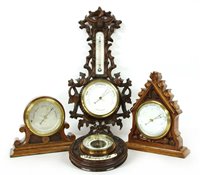 Lot 378 - Four aneroid barometers: two wall hanging