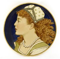 Lot 23 - A Minton's Art Pottery Studio charger depicting female portrait