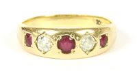 Lot 17 - A gold five stone graduated ruby and diamond ring