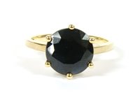 Lot 19 - A gold single stone circular cut sapphire ring