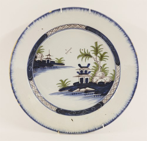 Lot 159 - An English delft charger
