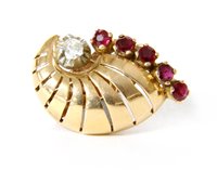 Lot 4 - A single gold diamond and ruby cornet shaped earring