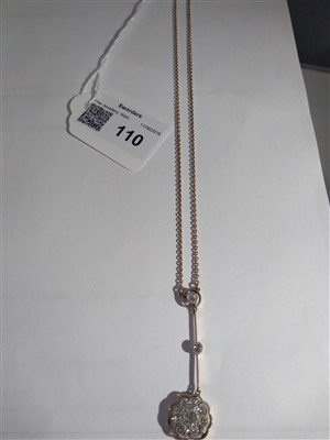 Lot 110 - A gold diamond set Edna May pendant, c.1915