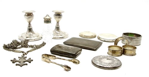 Lot 87 - A pair of hallmarked silver dwarf candlesticks