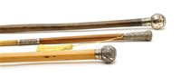 Lot 364 - Two silver topped riding crops and a swagger stick